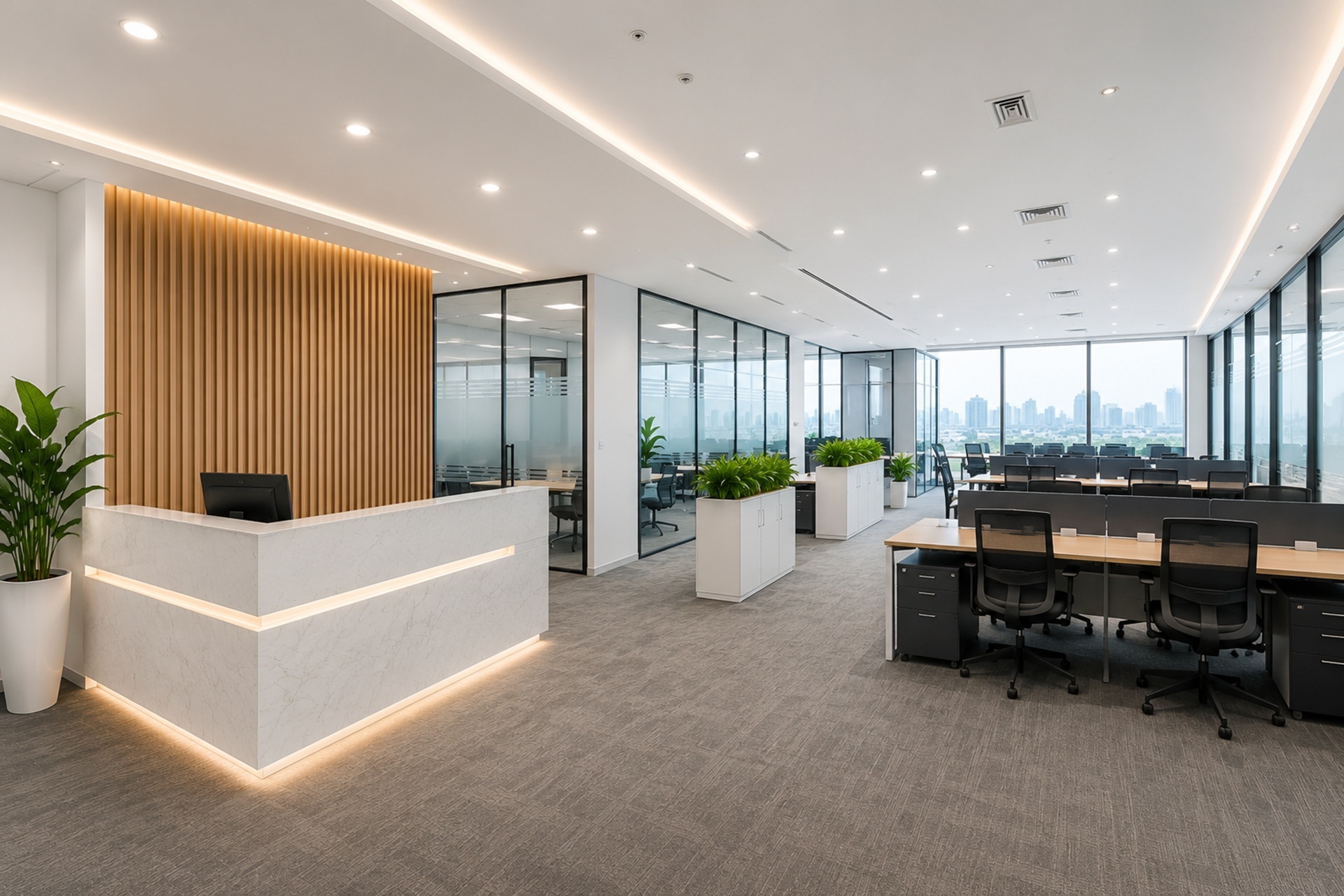 Modern office fit-out project in Dubai featuring a combined workspace created from two office units, including reception area, meeting room, open workstations, and manager cabin.