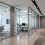 Modern commercial office with glass, aluminium, and gypsum partition systems installed for a professional workspace in Dubai, UAE